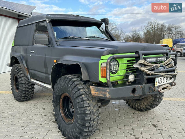 Черный Ниссан Патрол, объемом двигателя 2.8 л и пробегом 300 тыс. км за 12000 $, фото 13 на Automoto.ua