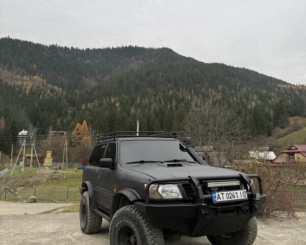 Чорний Ніссан Патрол, об'ємом двигуна 2.83 л та пробігом 307 тис. км за 14800 $, фото 8 на Automoto.ua
