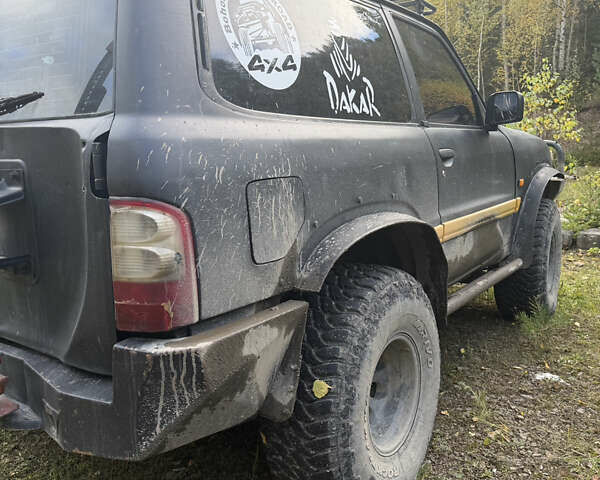Черный Ниссан Патрол, объемом двигателя 2.83 л и пробегом 307 тыс. км за 15000 $, фото 6 на Automoto.ua