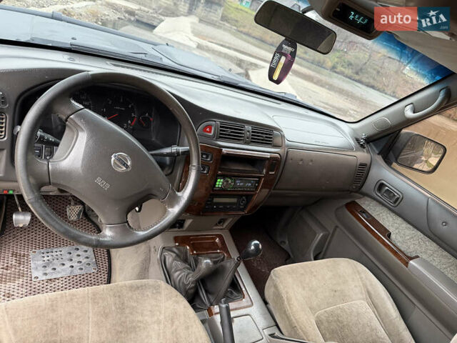 Чорний Ніссан Патрол, об'ємом двигуна 2.83 л та пробігом 307 тис. км за 14800 $, фото 13 на Automoto.ua