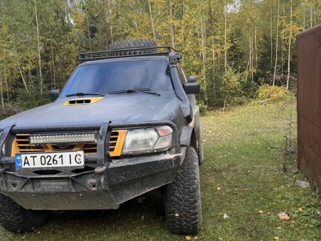 Черный Ниссан Патрол, объемом двигателя 2.8 л и пробегом 306 тыс. км за 15000 $, фото 2 на Automoto.ua