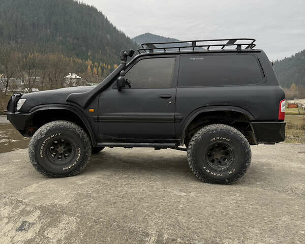 Чорний Ніссан Патрол, об'ємом двигуна 2.83 л та пробігом 307 тис. км за 14800 $, фото 6 на Automoto.ua