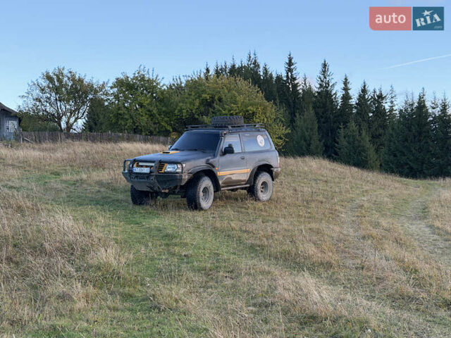 Черный Ниссан Патрол, объемом двигателя 2.83 л и пробегом 307 тыс. км за 15000 $, фото 9 на Automoto.ua