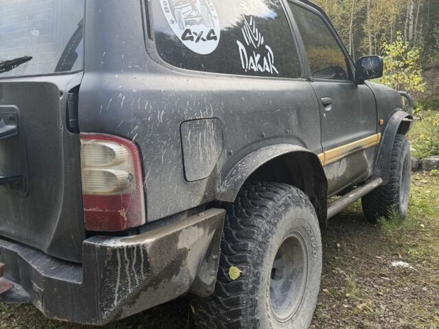 Черный Ниссан Патрол, объемом двигателя 2.8 л и пробегом 306 тыс. км за 15000 $, фото 9 на Automoto.ua