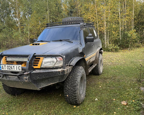 Черный Ниссан Патрол, объемом двигателя 2.83 л и пробегом 307 тыс. км за 15000 $, фото 3 на Automoto.ua