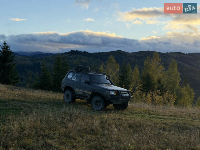 Черный Ниссан Патрол, объемом двигателя 2.83 л и пробегом 307 тыс. км за 15000 $, фото 10 на Automoto.ua