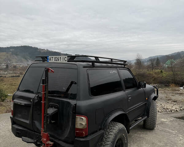 Чорний Ніссан Патрол, об'ємом двигуна 2.83 л та пробігом 307 тис. км за 14800 $, фото 9 на Automoto.ua