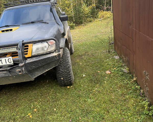 Черный Ниссан Патрол, объемом двигателя 2.83 л и пробегом 307 тыс. км за 15000 $, фото 1 на Automoto.ua