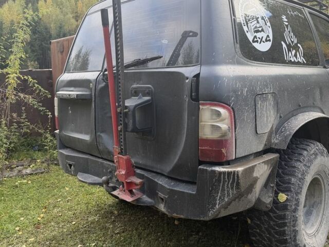 Черный Ниссан Патрол, объемом двигателя 2.8 л и пробегом 306 тыс. км за 15000 $, фото 6 на Automoto.ua