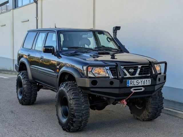 Черный Ниссан Патрол, объемом двигателя 2.8 л и пробегом 133 тыс. км за 2700 $, фото 2 на Automoto.ua