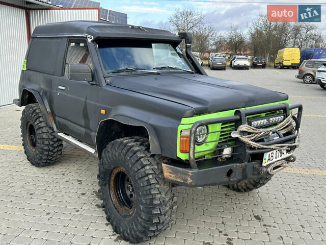 Черный Ниссан Патрол, объемом двигателя 2.8 л и пробегом 300 тыс. км за 12000 $, фото 12 на Automoto.ua