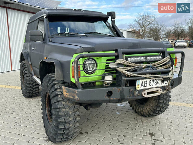 Черный Ниссан Патрол, объемом двигателя 2.8 л и пробегом 300 тыс. км за 12000 $, фото 11 на Automoto.ua