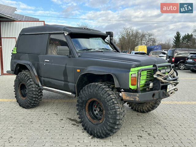 Черный Ниссан Патрол, объемом двигателя 2.8 л и пробегом 300 тыс. км за 12000 $, фото 14 на Automoto.ua