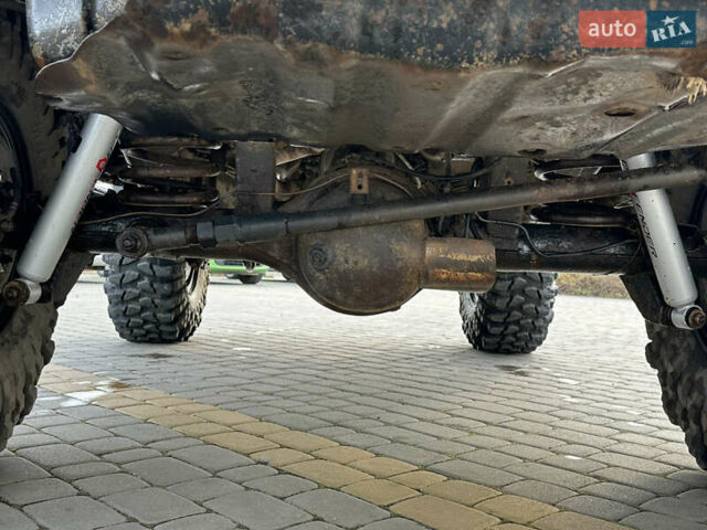 Черный Ниссан Патрол, объемом двигателя 2.8 л и пробегом 300 тыс. км за 12000 $, фото 24 на Automoto.ua