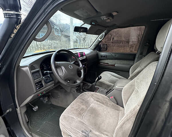 Черный Ниссан Патрол, объемом двигателя 2.83 л и пробегом 307 тыс. км за 15000 $, фото 14 на Automoto.ua