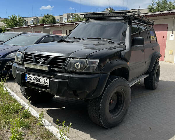 Чорний Ніссан Патрол, об'ємом двигуна 3 л та пробігом 240 тис. км за 13200 $, фото 10 на Automoto.ua