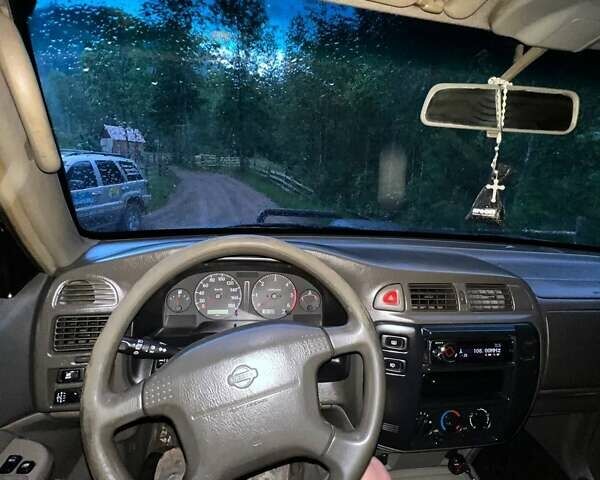 Черный Ниссан Патрол, объемом двигателя 2.95 л и пробегом 338 тыс. км за 10800 $, фото 11 на Automoto.ua