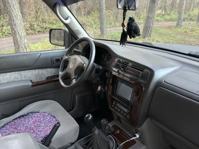 Черный Ниссан Патрол, объемом двигателя 3 л и пробегом 251 тыс. км за 9000 $, фото 13 на Automoto.ua