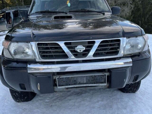 Черный Ниссан Патрол, объемом двигателя 3 л и пробегом 200 тыс. км за 8300 $, фото 1 на Automoto.ua