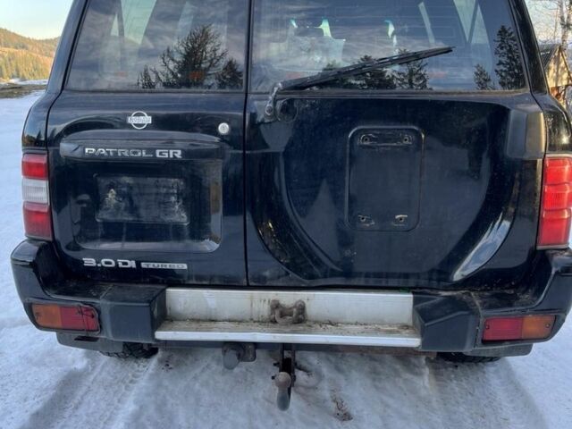 Черный Ниссан Патрол, объемом двигателя 3 л и пробегом 200 тыс. км за 8300 $, фото 4 на Automoto.ua