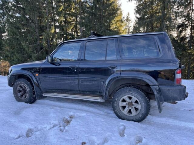 Черный Ниссан Патрол, объемом двигателя 3 л и пробегом 200 тыс. км за 8300 $, фото 5 на Automoto.ua