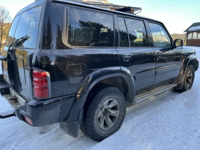 Черный Ниссан Патрол, объемом двигателя 3 л и пробегом 200 тыс. км за 8300 $, фото 3 на Automoto.ua