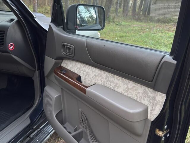 Черный Ниссан Патрол, объемом двигателя 3 л и пробегом 251 тыс. км за 9000 $, фото 11 на Automoto.ua