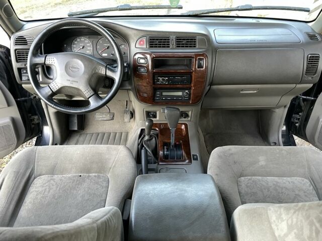 Чорний Ніссан Патрол, об'ємом двигуна 3 л та пробігом 350 тис. км за 7999 $, фото 6 на Automoto.ua