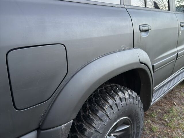 Черный Ниссан Патрол, объемом двигателя 3 л и пробегом 251 тыс. км за 9000 $, фото 7 на Automoto.ua