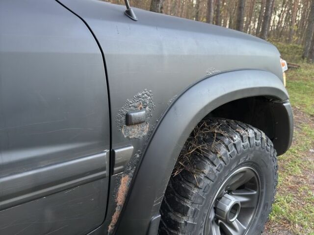 Черный Ниссан Патрол, объемом двигателя 3 л и пробегом 251 тыс. км за 9000 $, фото 9 на Automoto.ua