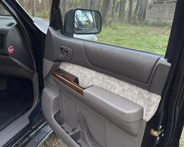 Черный Ниссан Патрол, объемом двигателя 3 л и пробегом 251 тыс. км за 9000 $, фото 14 на Automoto.ua