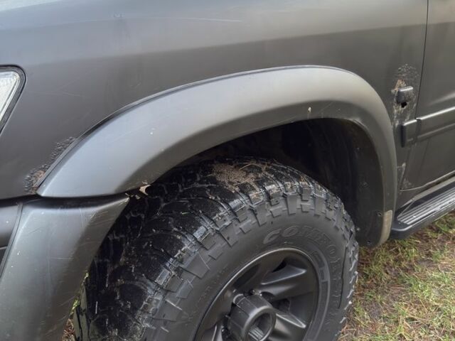 Черный Ниссан Патрол, объемом двигателя 3 л и пробегом 251 тыс. км за 9000 $, фото 2 на Automoto.ua