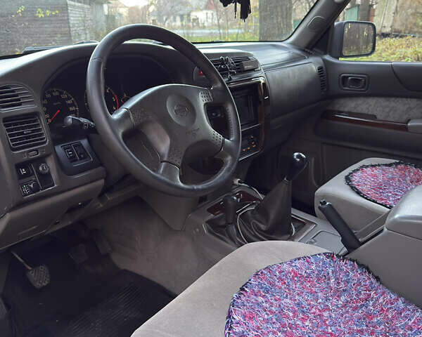 Черный Ниссан Патрол, объемом двигателя 3 л и пробегом 251 тыс. км за 9000 $, фото 17 на Automoto.ua