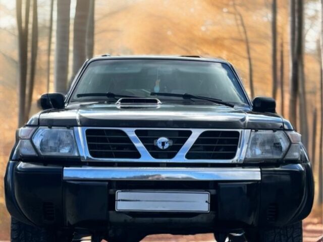 Чорний Ніссан Патрол, об'ємом двигуна 3 л та пробігом 350 тис. км за 7999 $, фото 3 на Automoto.ua