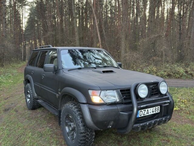 Черный Ниссан Патрол, объемом двигателя 3 л и пробегом 251 тыс. км за 9000 $, фото 10 на Automoto.ua