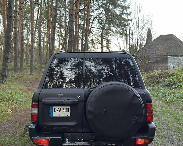 Черный Ниссан Патрол, объемом двигателя 3 л и пробегом 251 тыс. км за 9000 $, фото 4 на Automoto.ua