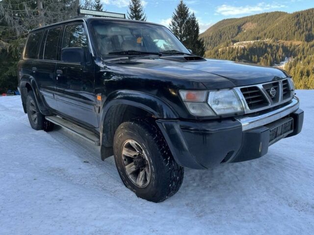 Черный Ниссан Патрол, объемом двигателя 3 л и пробегом 200 тыс. км за 8300 $, фото 2 на Automoto.ua