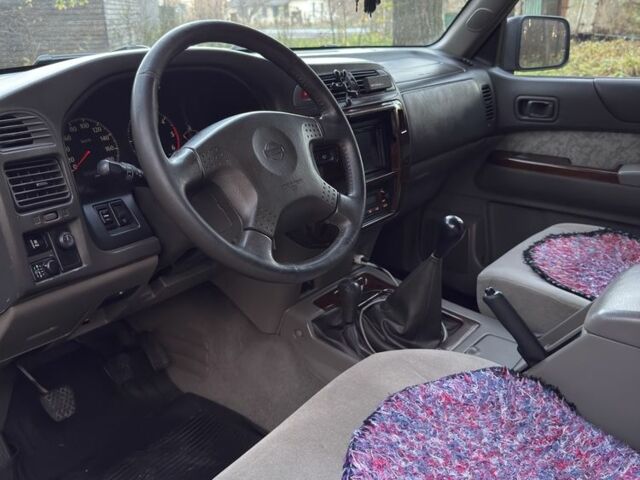 Черный Ниссан Патрол, объемом двигателя 3 л и пробегом 251 тыс. км за 9000 $, фото 16 на Automoto.ua
