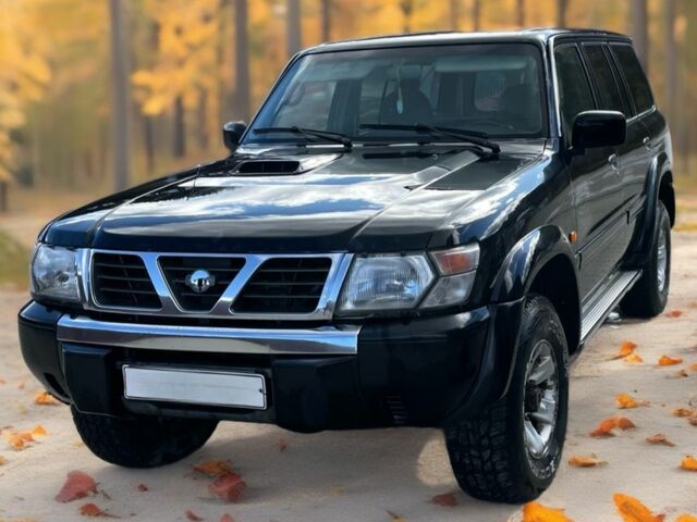 Чорний Ніссан Патрол, об'ємом двигуна 3 л та пробігом 350 тис. км за 7999 $, фото 4 на Automoto.ua