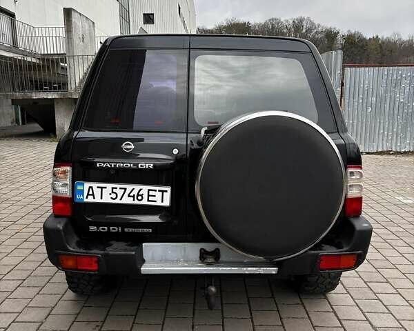 Черный Ниссан Патрол, объемом двигателя 3 л и пробегом 276 тыс. км за 22500 $, фото 8 на Automoto.ua