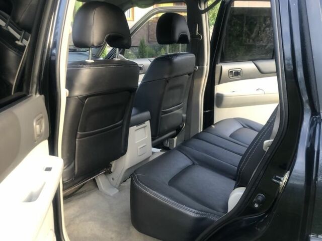 Черный Ниссан Патрол, объемом двигателя 3 л и пробегом 130 тыс. км за 17700 $, фото 7 на Automoto.ua