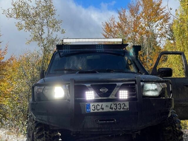 Черный Ниссан Патрол, объемом двигателя 3 л и пробегом 300 тыс. км за 6500 $, фото 5 на Automoto.ua