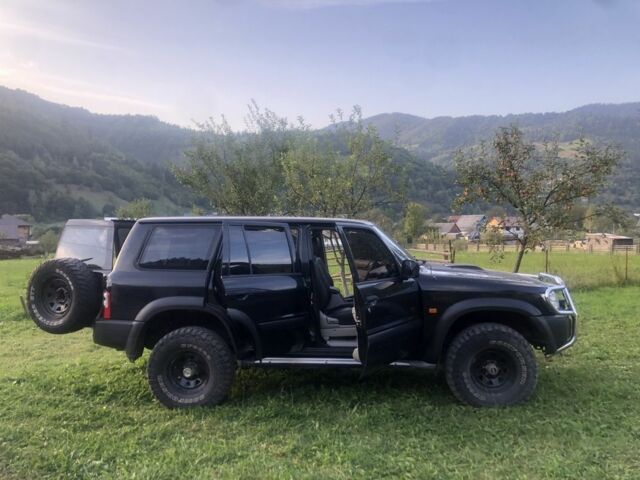 Черный Ниссан Патрол, объемом двигателя 3 л и пробегом 130 тыс. км за 17700 $, фото 4 на Automoto.ua