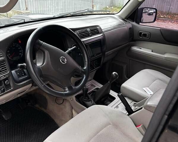 Черный Ниссан Патрол, объемом двигателя 3 л и пробегом 276 тыс. км за 22500 $, фото 3 на Automoto.ua