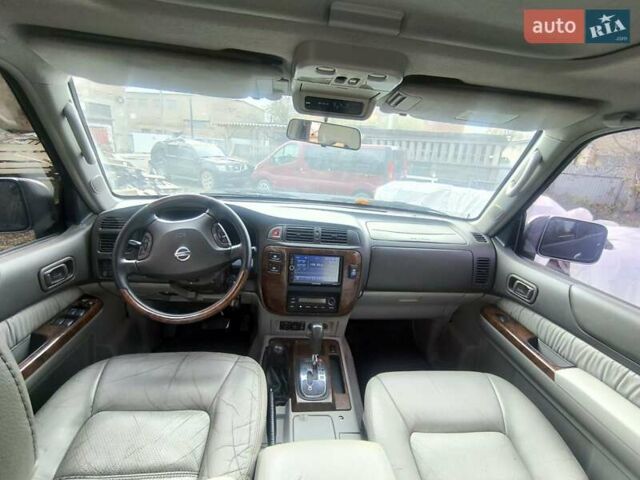 Черный Ниссан Патрол, объемом двигателя 4.8 л и пробегом 396 тыс. км за 37000 $, фото 9 на Automoto.ua