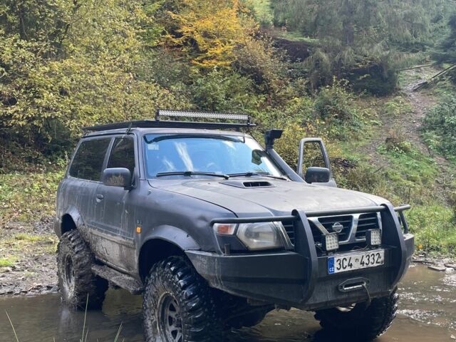 Черный Ниссан Патрол, объемом двигателя 3 л и пробегом 300 тыс. км за 6800 $, фото 8 на Automoto.ua