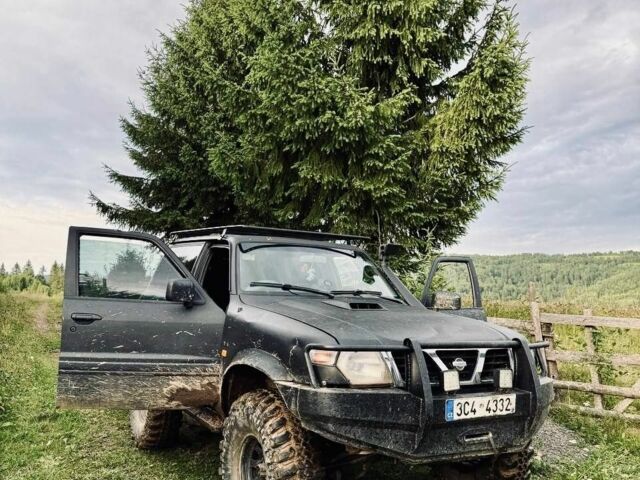 Черный Ниссан Патрол, объемом двигателя 3 л и пробегом 300 тыс. км за 6500 $, фото 2 на Automoto.ua