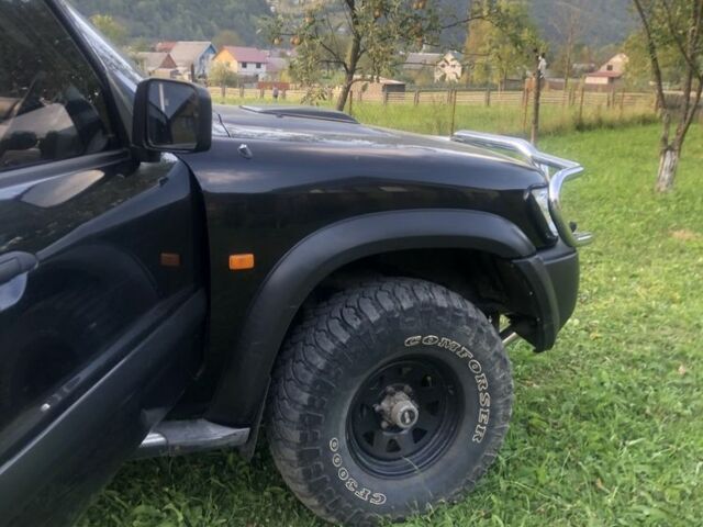 Черный Ниссан Патрол, объемом двигателя 3 л и пробегом 130 тыс. км за 17700 $, фото 5 на Automoto.ua