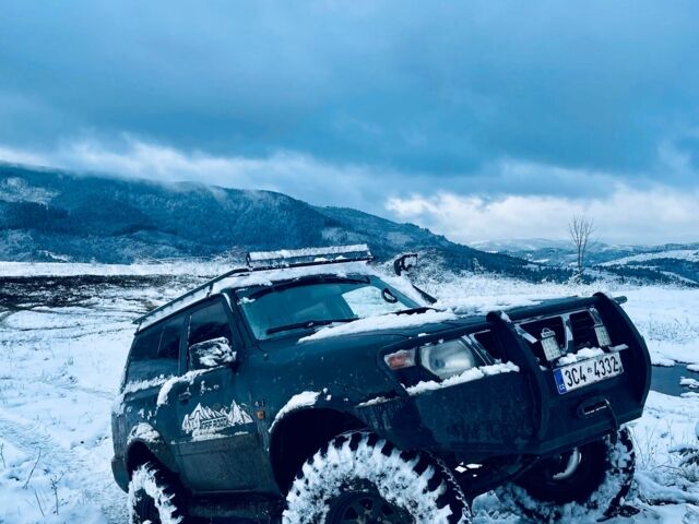 Черный Ниссан Патрол, объемом двигателя 3 л и пробегом 300 тыс. км за 6100 $, фото 1 на Automoto.ua