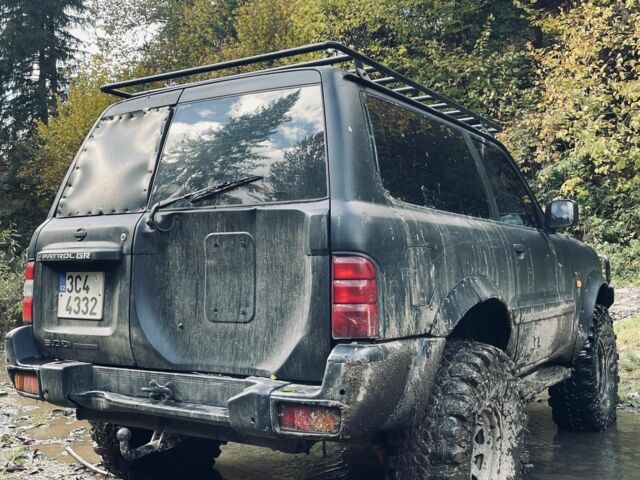 Черный Ниссан Патрол, объемом двигателя 3 л и пробегом 300 тыс. км за 6800 $, фото 7 на Automoto.ua